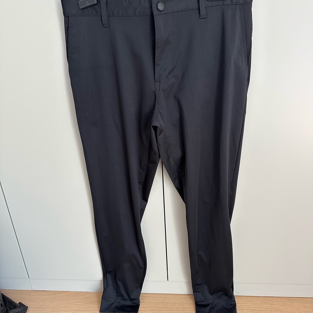 RHONE Black Dress Pants with Flat Front Design